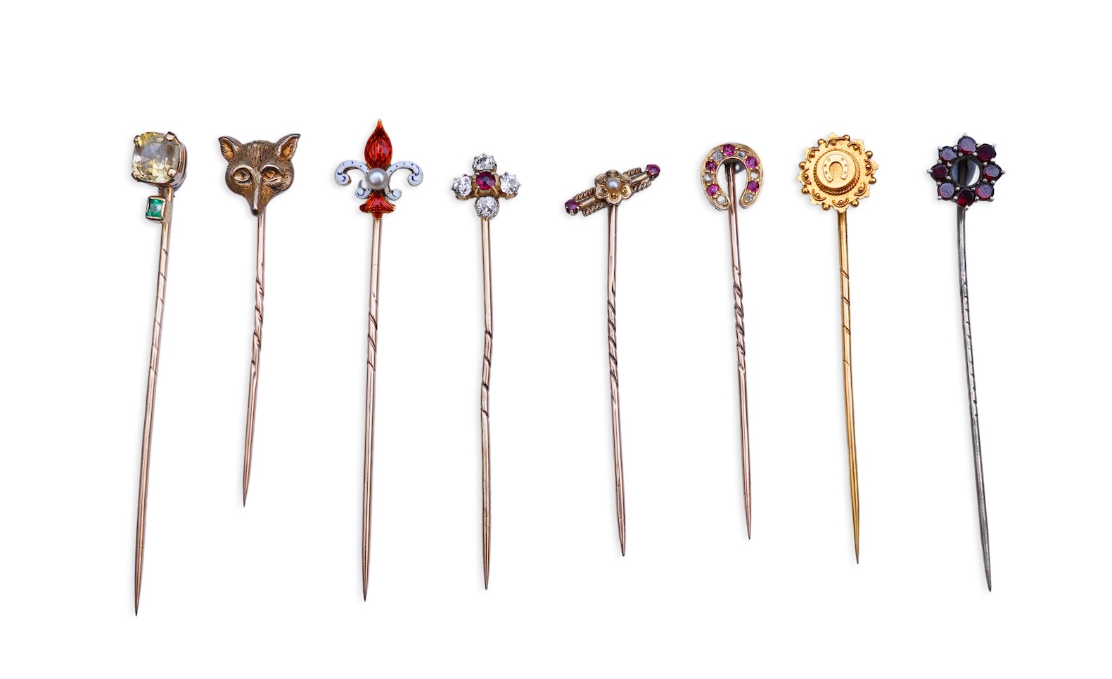 A collection of eight tie pins, 19th and 20th century